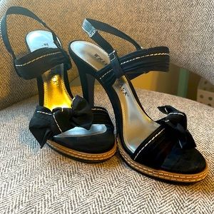 White House Black Market heeled black sandals. Great for a night out!